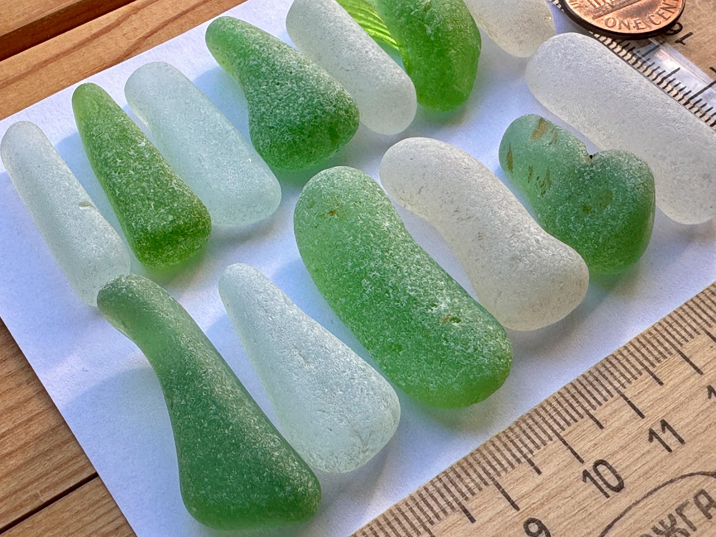 white and green sea glass pieces