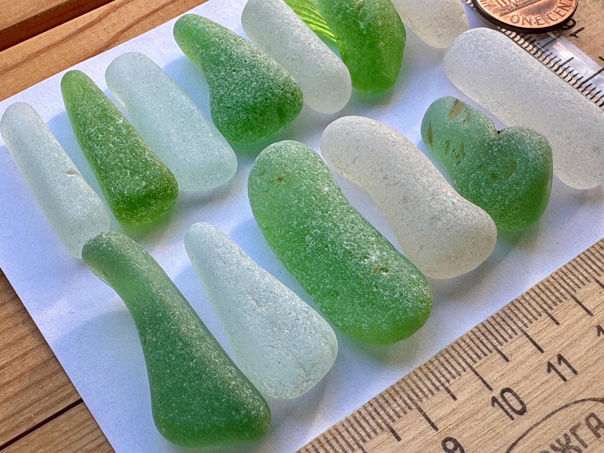 white and green sea glass pieces